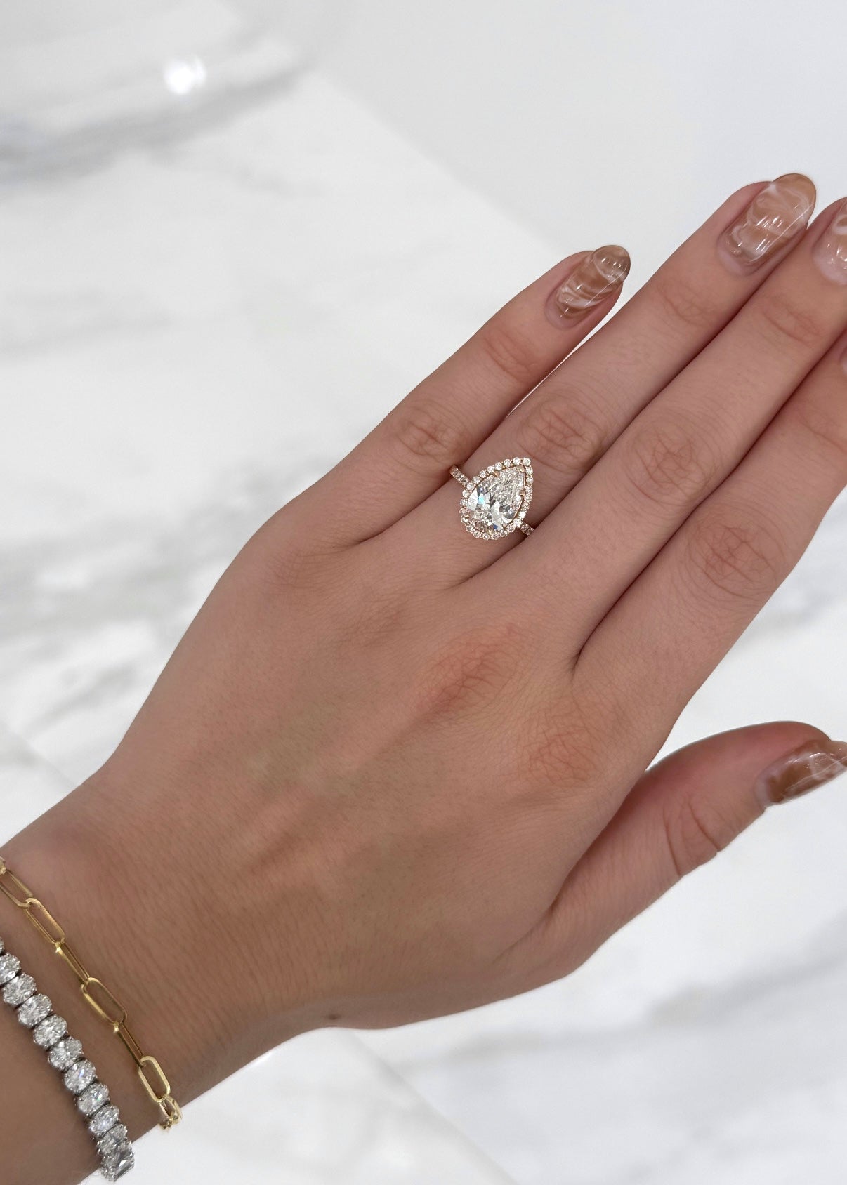 Pear Cut with Diamond Halo and Cathedral Pave