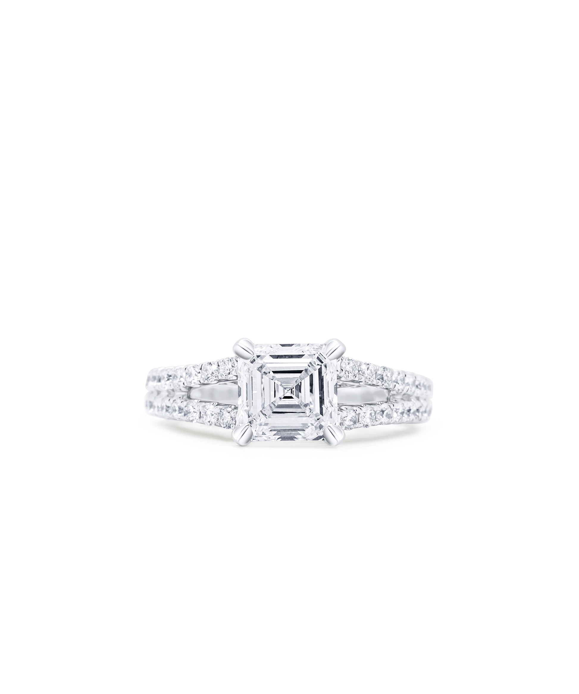 Diamond engagement ring with a central asscher cut diamond and a split shank diamond pave band with smaller diamonds