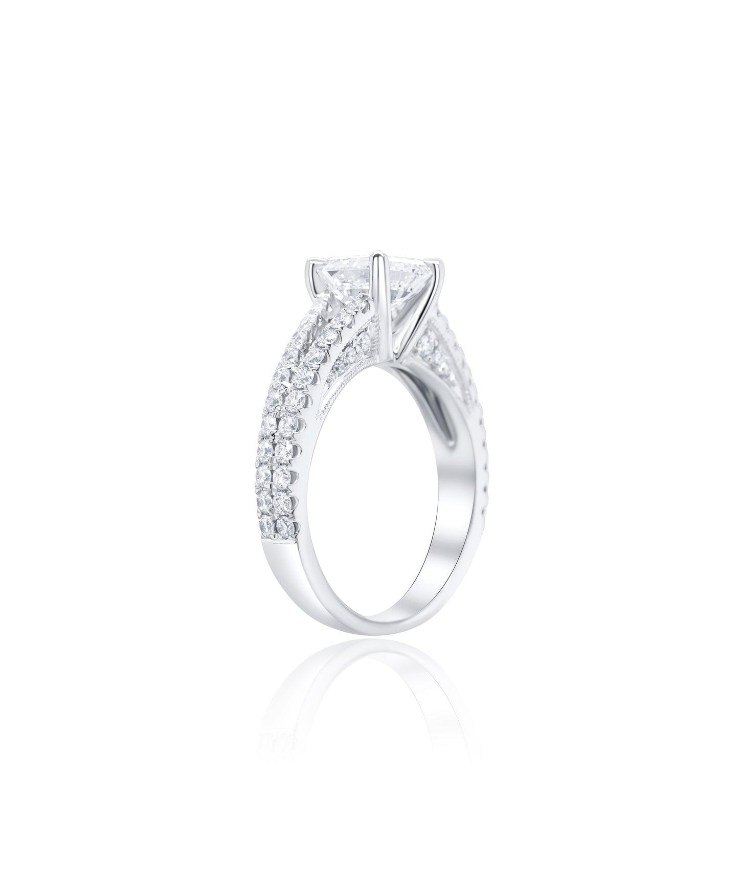 Diamond engagement ring with a central asscher cut diamond and a split shank diamond pave band with smaller diamonds