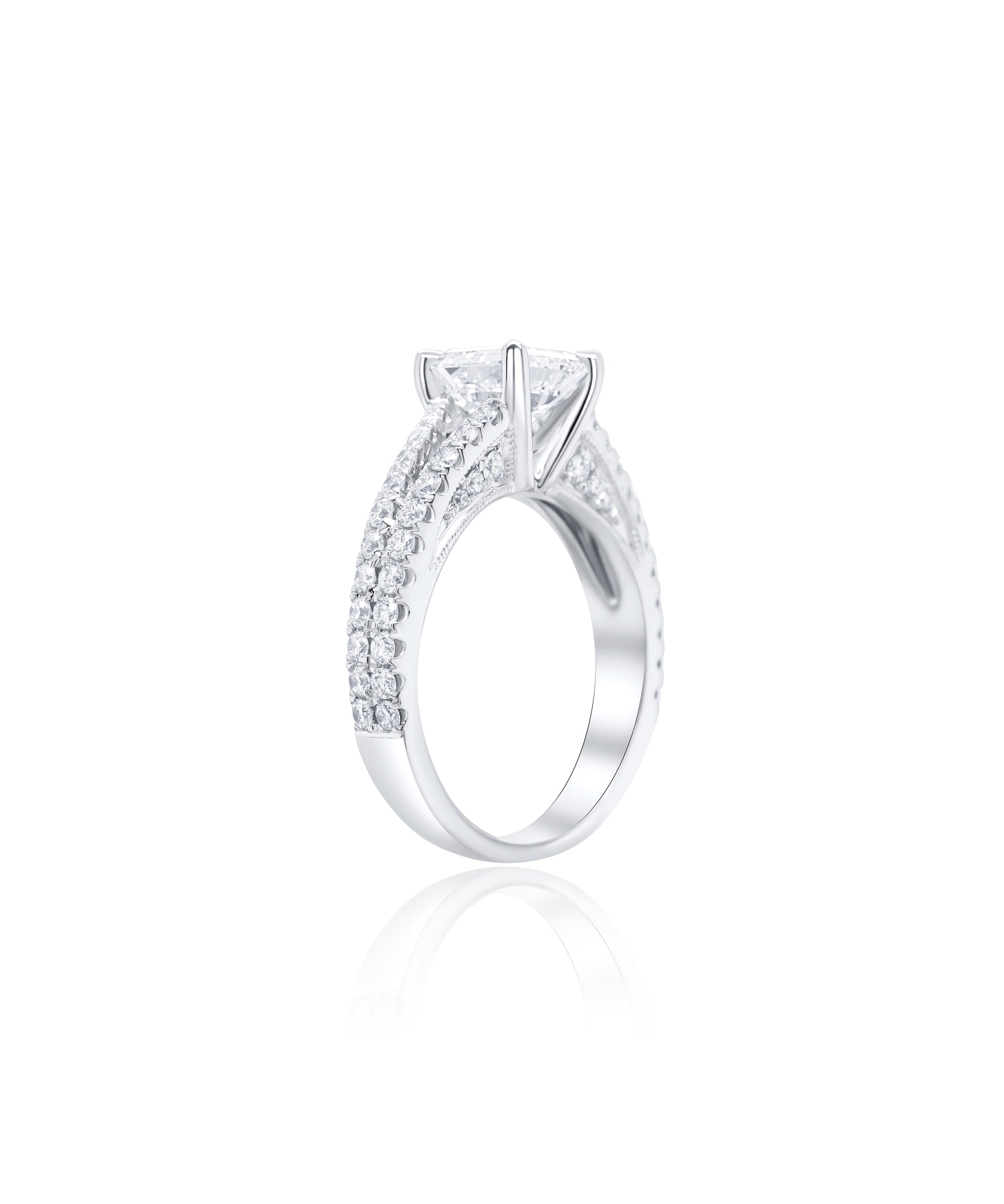 Diamond engagement ring with a central asscher cut diamond and a split shank diamond pave band with smaller diamonds