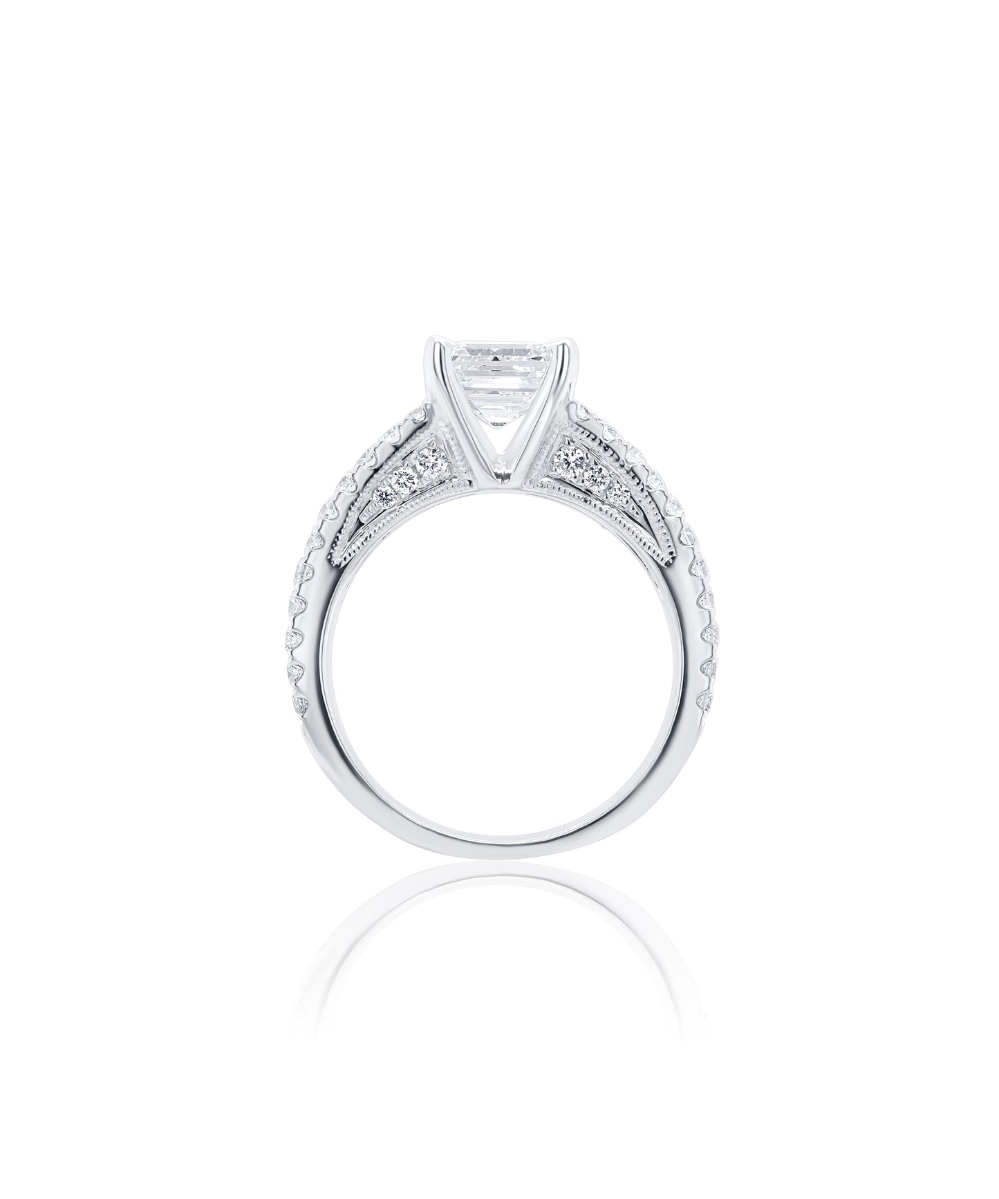 Diamond engagement ring with a central asscher cut diamond and a split shank diamond pave band with smaller diamonds in a cathedral setting