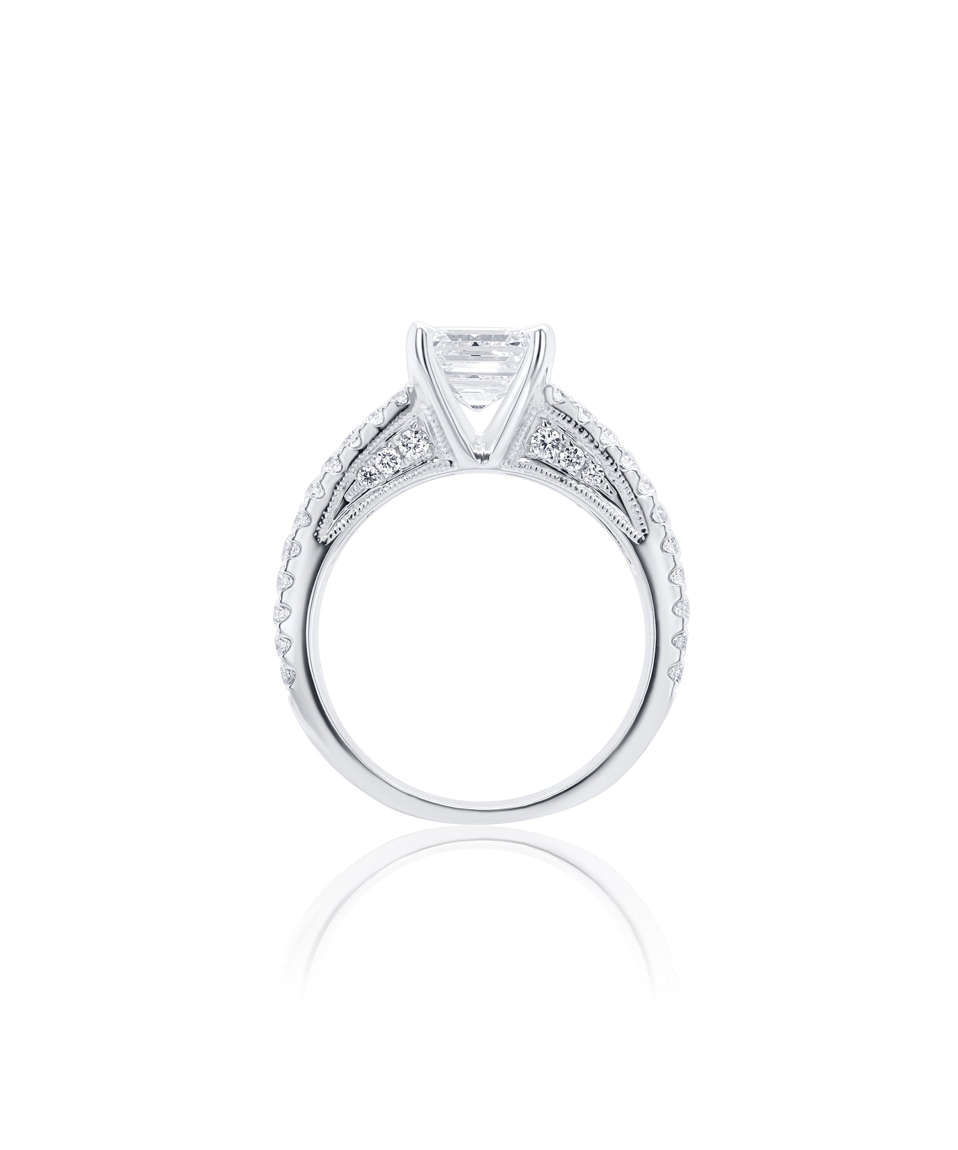Diamond engagement ring with a central asscher cut diamond and a split shank diamond pave band with smaller diamonds in a cathedral setting