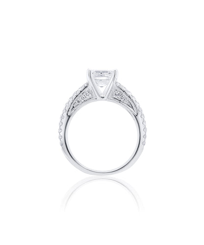 Diamond engagement ring with a central asscher cut diamond and a split shank diamond pave band with smaller diamonds in a cathedral setting