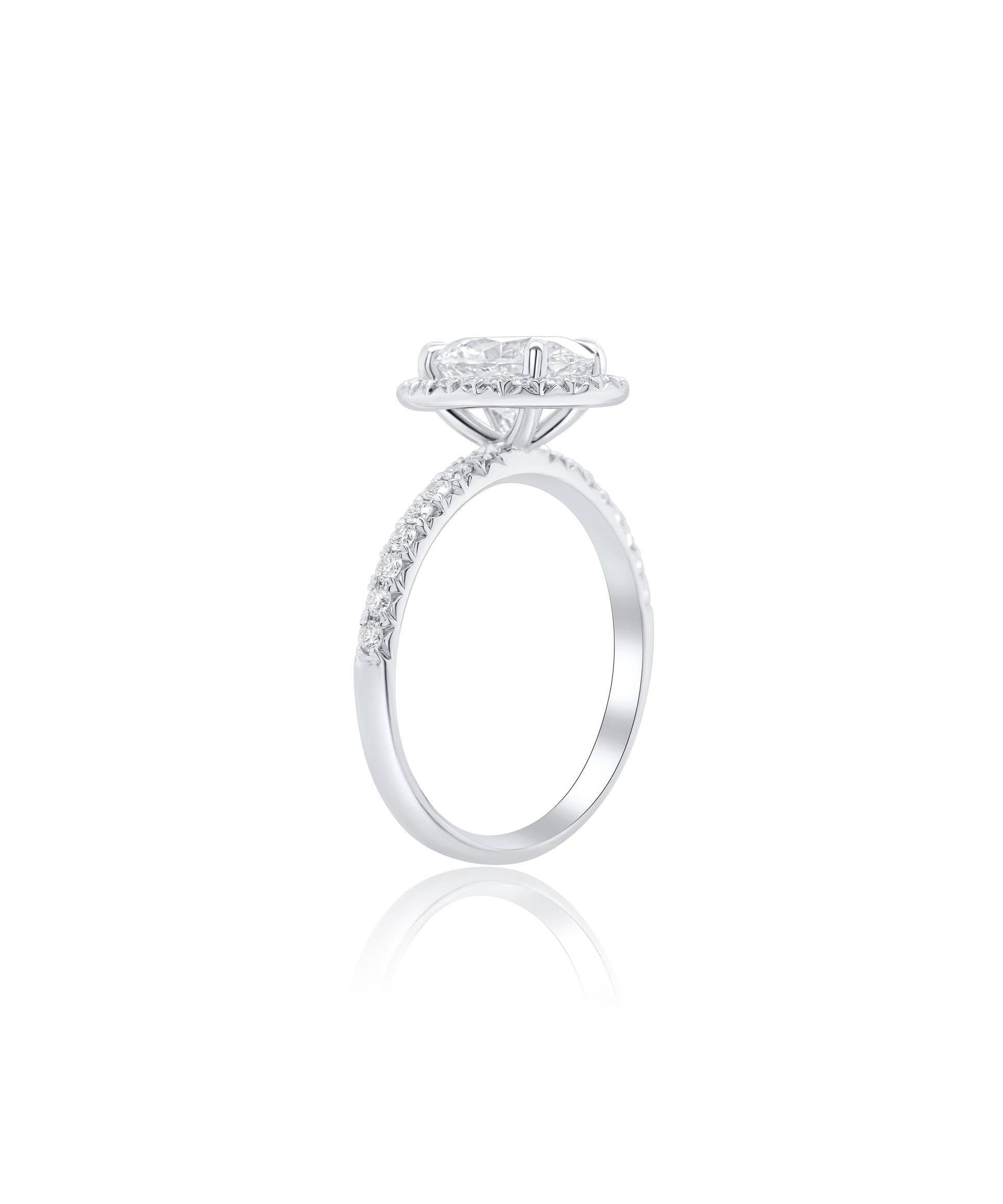 Oval Cut diamond engagement ring set in claw prongs with a diamond halo and band with diamonds pave set halfway around 