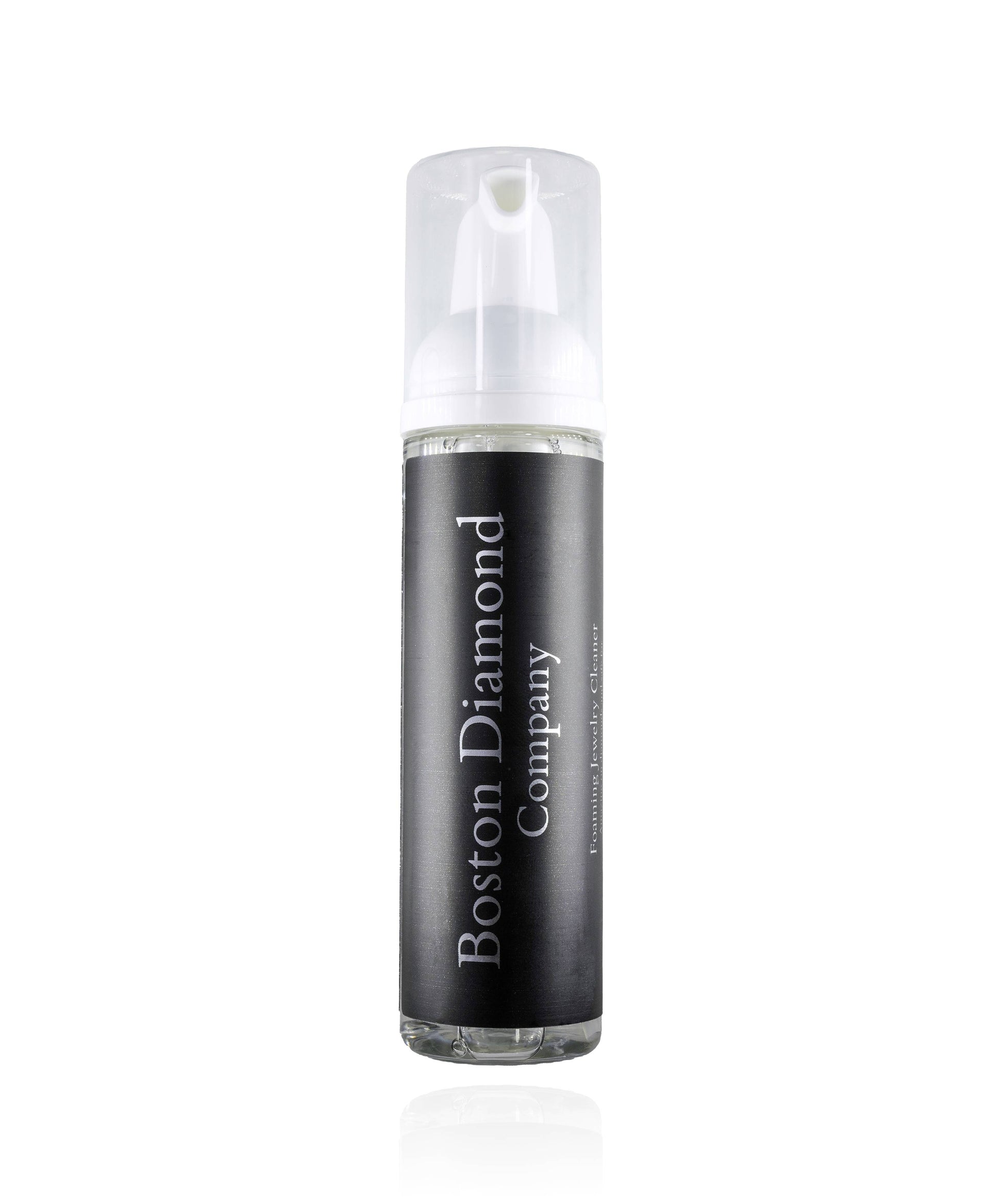A clear plastic bottle with a white pump, filled with all natural foam jewelry cleaner, labeled 'Boston Diamond Company'