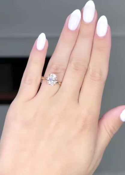 Hidden Halo Oval Cut with Feather Band